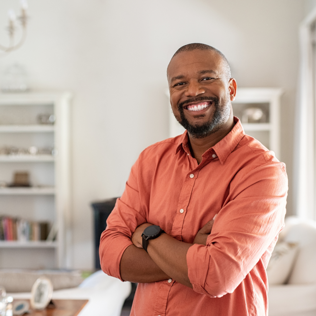 man in his home smiling