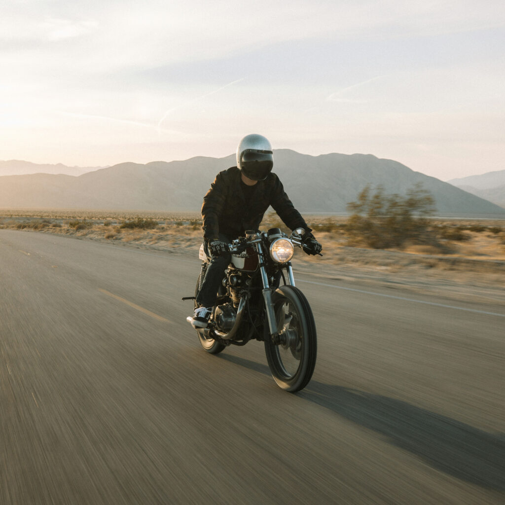 man driving motorcycle